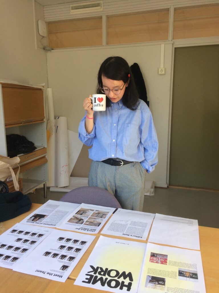 A person holding a cup of coffee